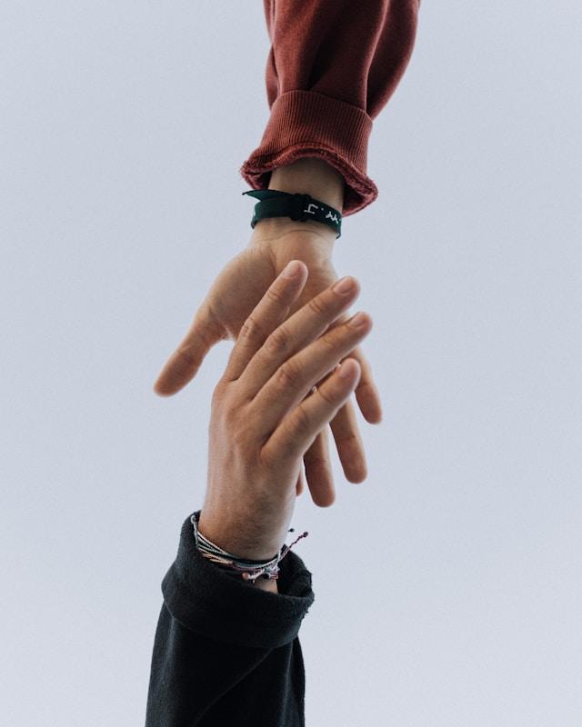 hands reaching image